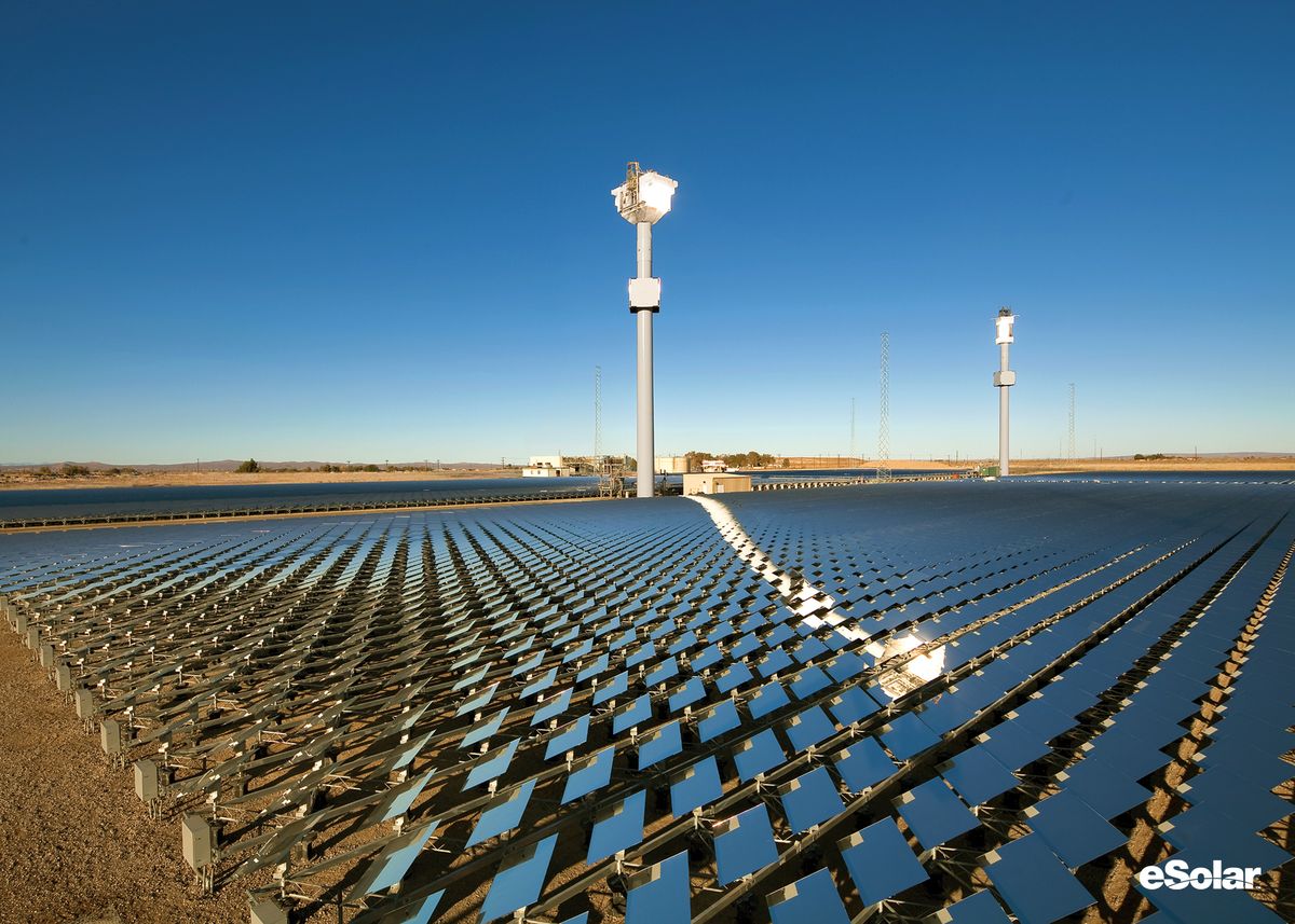 Two receiver towers above a field of small heliostats at eSolar’s Sierra SunTower plant